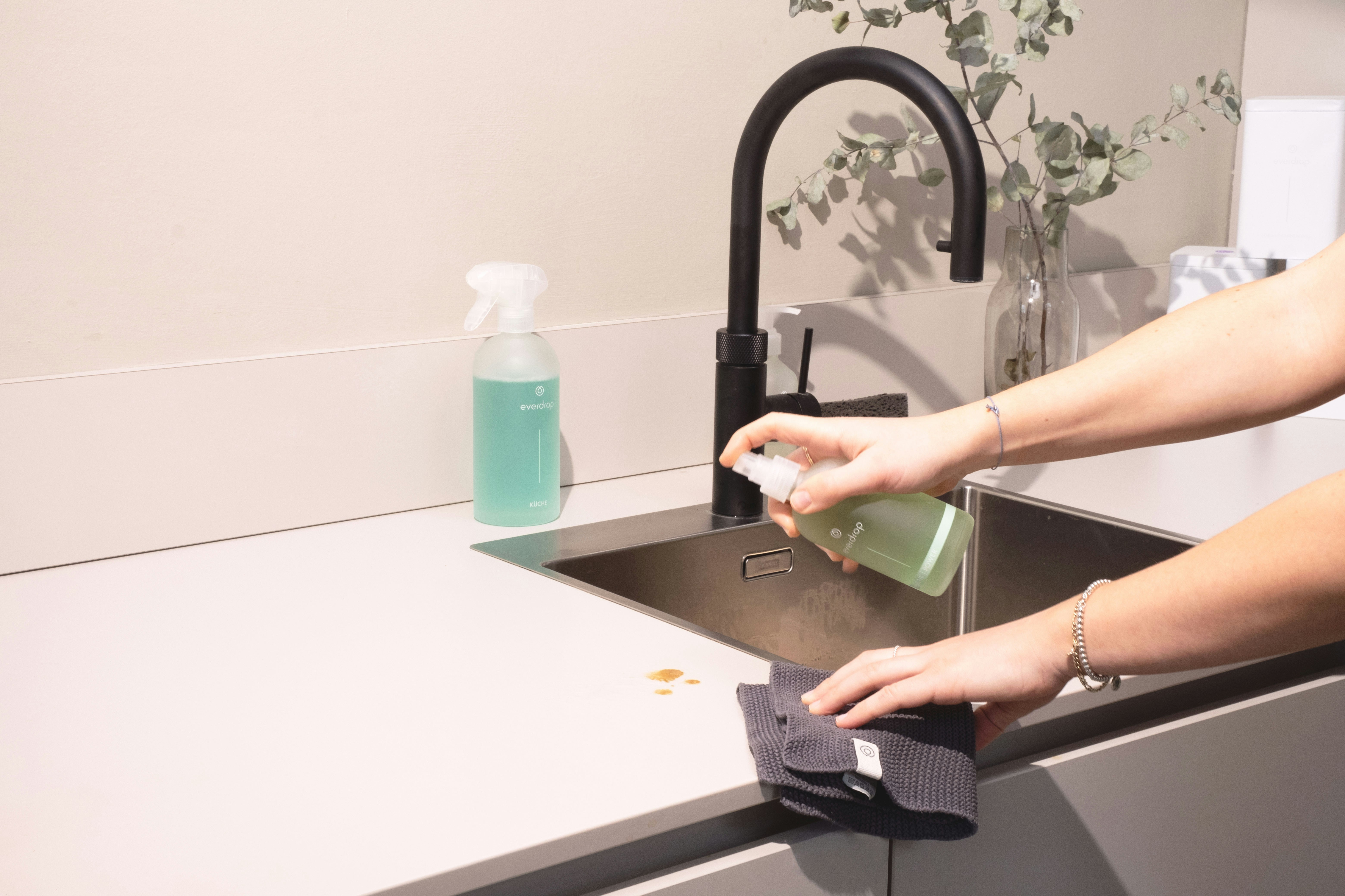Cleaning supplies and sink